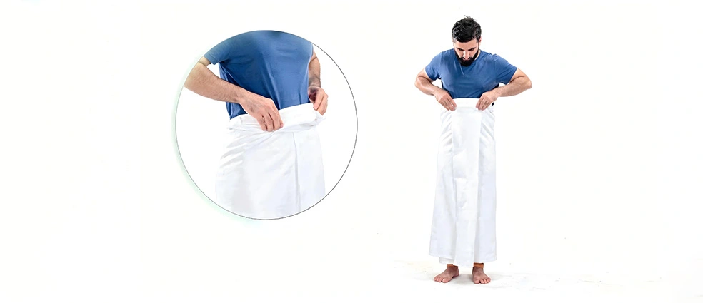 Men wearing unstitched white sheets (Izar and Rida) and women in simple modest clothing for Ihram during Umrah or Hajj